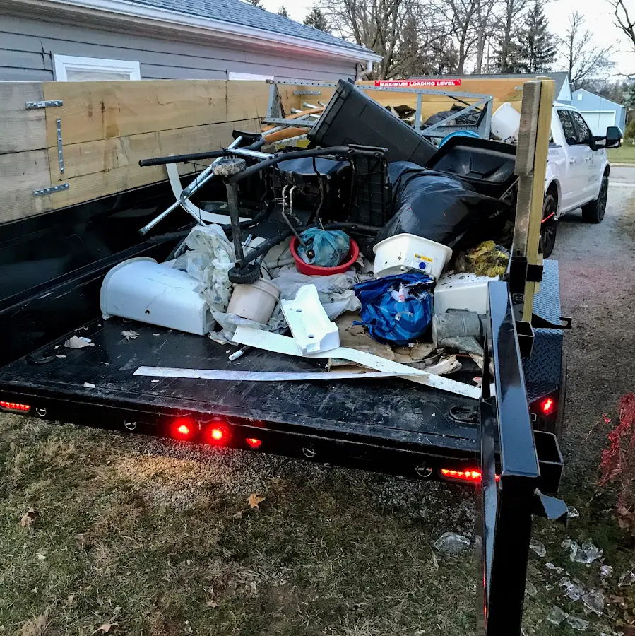 Roll-off dumpster delivered to a residential driveway in Colesville